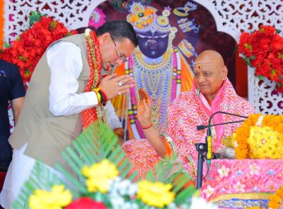 यमकेश्वर भागवत कथा में धामी, बोले- धर्म और विकास साथ-साथ