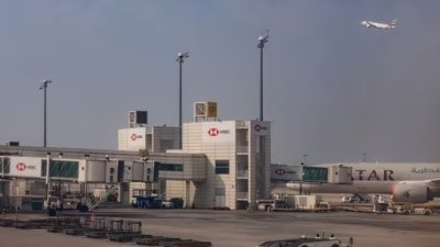 Drone Incident Near Dubai Airport Injures Four; UAE Intercepts Iranian Missiles Amid Rising Regional Tensions