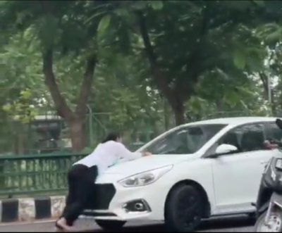 Dispute Turns Shocking as Woman Is Carried on Car Bonnet
